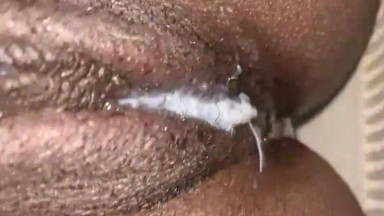 fingers her creamy pussy